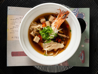 asian soup on the black plate