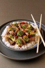 Chinese Beef and Lemon Broccoli  with rice and chop sticks