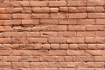 old red ochre painted clean brick wall