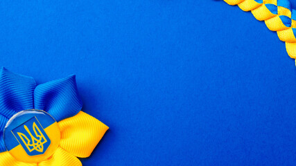Ukraine flag symbol background. Ukrainian flower trident symbol isolated on blue banner. Support Ukraine concept.