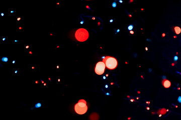 Blue red white dot Lighting illumination and decoration items bokeh on black for Christmas and New Year Celebration