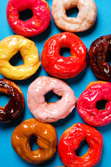 National Donut Day. Donuts on the color background