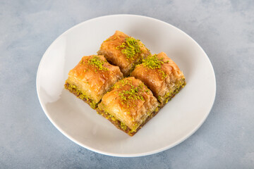  Pistachio baklava on a white plate