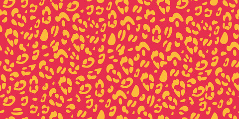 Leopard pink and yellow seamless pattern. Animalistic print for fabric, paper. Vector hand-drawn background. 