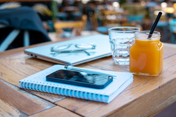 Smartphone on a table in a cafe