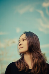 Young women thoughtful and looking at faraway