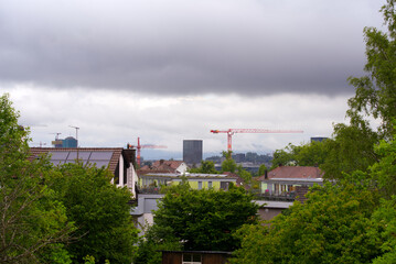 Modern skyline of City of Z&uuml;rich with cranes and office towers on a cloudy spring day. Photo taken May 4th, 2022, Zurich, Switzerland.