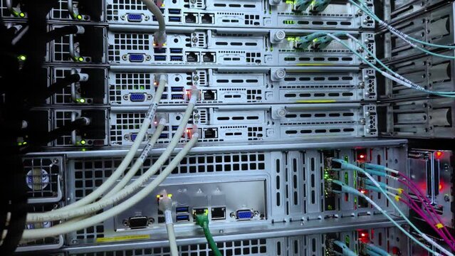 Optical fiber. Severs computer in a rack at the large data center.