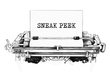 SNEAK PEEK typed words on a old Vintage Typewriter.
