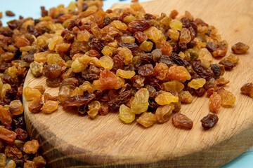 raisins close-up on a wooden board