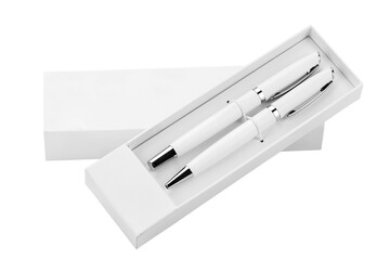 Two white ballpoint pens in a box on a white background.