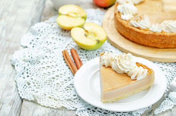 Apple souffle cake with whipped cream