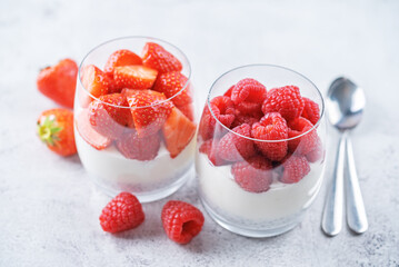 Greek yogurt Chia seeds strawberry and raspberry parfait in a glass