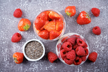 Greek yogurt Chia seeds strawberry and raspberry parfait in a glass