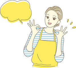 笑顔でOKサイン　エプロン姿の若い女性　主婦