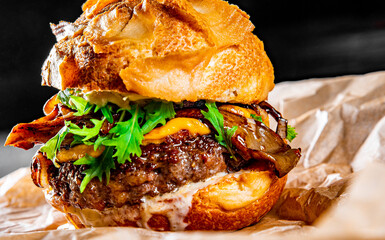 beef burger with meat, mushroom, vegetables and cheese