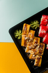 A traditional Japanese dish made from rice and fish.
Photo taken in a sushi bar in Vinnytsia