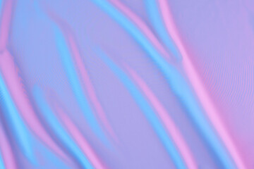 Holographic neon colors on gradient soft pastel background. Trendy creative gradient in Iridescent neon color.