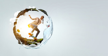 Young woman riding her skateboard © Sergey Nivens