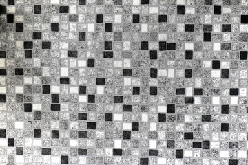 Fototapeta premium black, grey and white square pattern on a wall