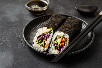nori roll on black background