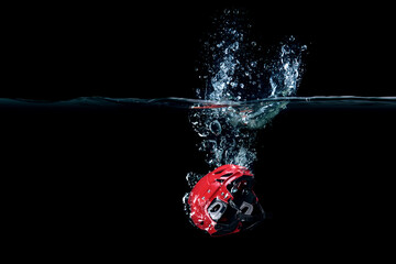 American football helmet in water