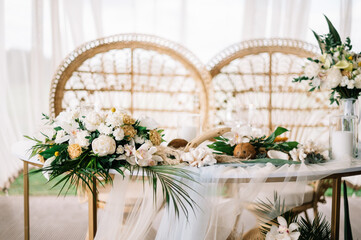 Wooden tables for wedding dinner decorated with tropical flowers, pineapples, coconuts and glass lamps. Concept of a tropical destination wedding.
Photo Formats
3760 × 5651 pixels • 12,5 × 18,8 in • D