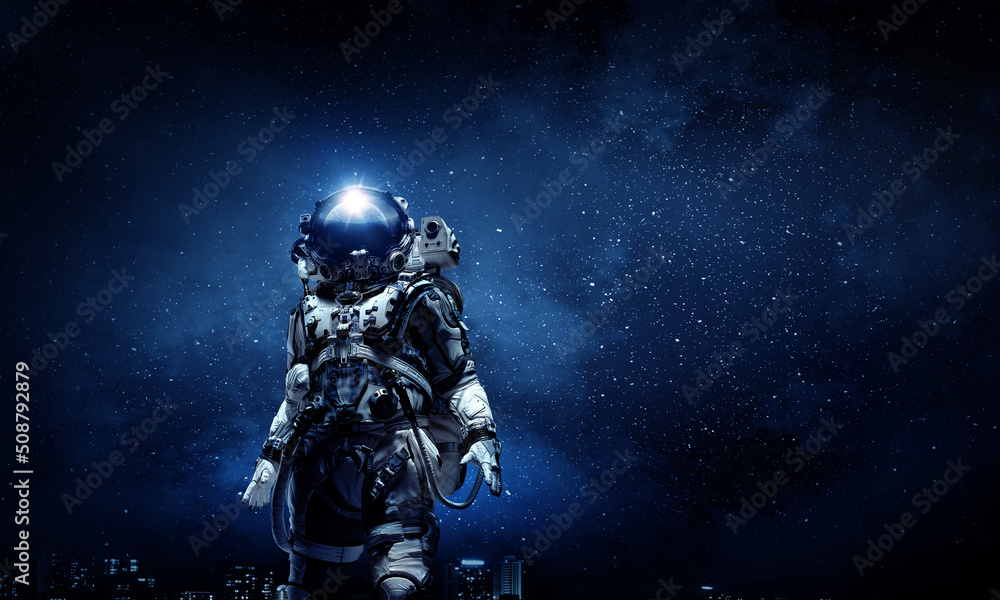 Canvas Prints astronaut walking on an unexplored planet