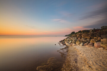 Sunrise over the pier in Mechelinki.