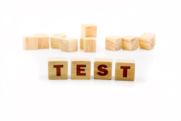 wooden cube box in wording TEST that is the FINAL step of Design thinking process , on white background