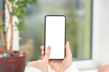 Cellphone mockup. woman user customer hold cellphone mockup with white screen in hand. Use mobile shopping app, check social media news, texting mobile sms order food delivery