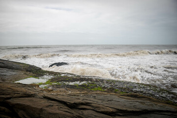 View of the orizonte at guaratuba beach, parana, brazil showing the sea and the rocks