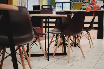 table with chairs in the interior of a modern cafe