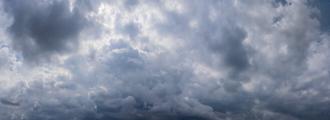 Fototapeta na wymiar Sky panorama with rainy clouds. Backround.