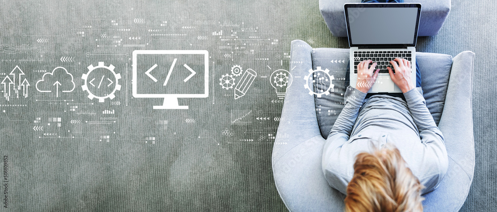 Poster web development concept with man using a laptop in a modern gray chair