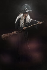 witch with her broom