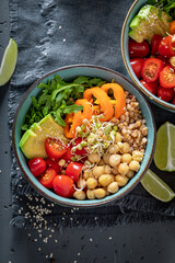 Healthy salad with chickpeas, vegetables and buckwheat groats.