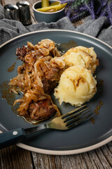Fried liver with onion.