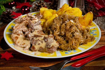 Stewed pork loin in a sauce with chanterelles.