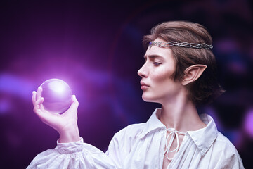 noble elf with magic sphere