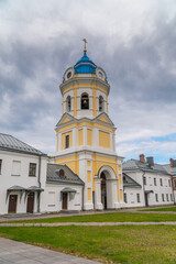 Fototapeta na wymiar Russia. Leningrad region. May 29, 2022. Bell tower of the Nativity of the Theotokos Monastery on the island of Konevets.