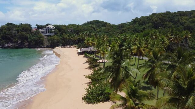 drone flying around a sandy beah