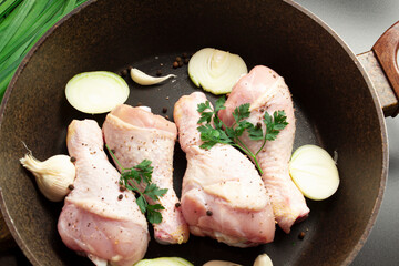 Marinated chicken legs with herbs and spices