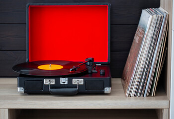 A retro-styled spinning record vinyl player.