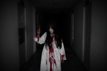Portrait of asian woman make up ghost,Scary horror scene for background,Halloween festival...