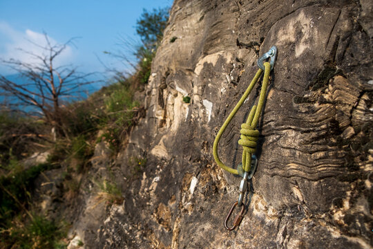 rock climbing rope with hooks .