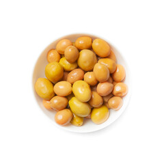 large green olives in a white bowl, isolated, view from above