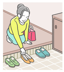 日本のマナー　玄関で靴を脱いで綺麗に揃える日本人女性　