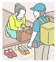 出前の配達員から、注文した料理を受け取る女性　