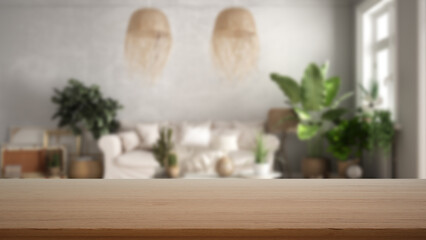 Empty wooden table, desk or shelf with blurred view of scandinavian living room, white sofa, potted plants and decors, modern interior design concept